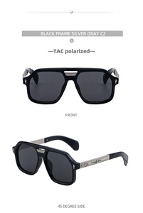 Close-up of black square sunglasses with silver metal accents and gray polarized lenses