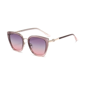 Modern cat-eye polarized sunglasses for women with purple gradient lenses and gold bridge
