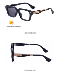 Detail view of square black frames with gold hollow metal temples and photochromic lenses