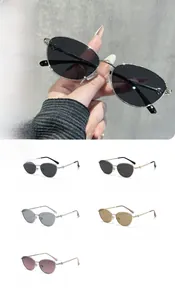 Détail de lunettes de soleil œil de chat polarisées avec monture fine en métal élégant