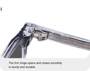 Close-up of firm metal hinge and intricate engraved patterns on transparent sunglass frames