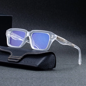 Square matte transparent frame sunglasses with blue reflective lenses and metal accents