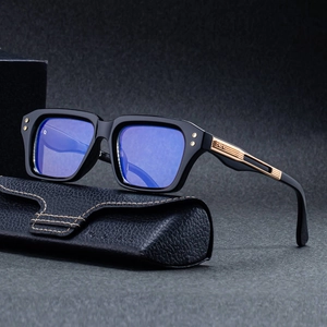 Men square photochromic sunglasses with black frame and golden metal temple details