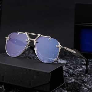 Steampunk rimless aviator sunglasses with blue lenses and silver engraved metal frame