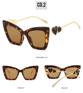 Three-angle view of cat-eye sunglasses with tortoiseshell frames and heart detail