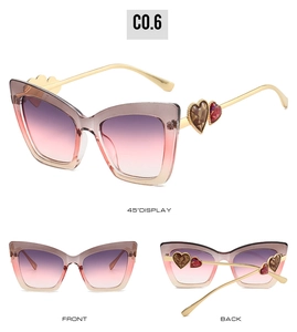 Cat eye sunglasses with gradient lenses and heart-shaped metal temples in three views