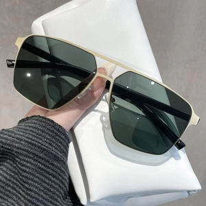 Classic pilot-style polarized sunglasses with gold metal frame and dark lenses