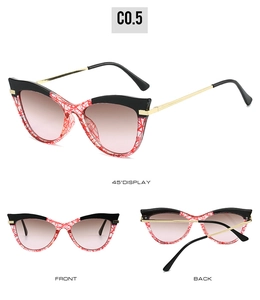 Cat eye sunglasses detail with red-white grid pattern and golden metal spring hinges