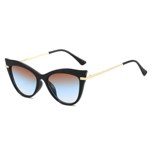 Women's cat eye sunglasses with black frame, gold metal legs and gradient lenses