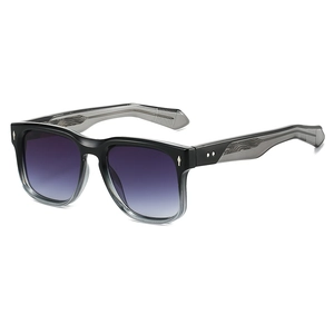 Retro oversized sunglasses with thick gradient frames and signature arrow metal rivets