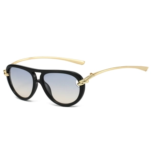 Lunettes aviateur rétro avec monture noire branches dorées et verres dégradés bleus