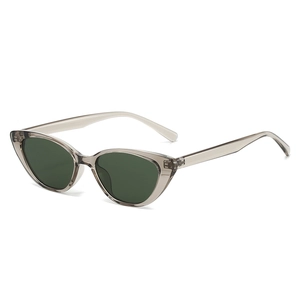 Retro cat-eye polarized sunglasses with transparent grey frame and dark green lenses