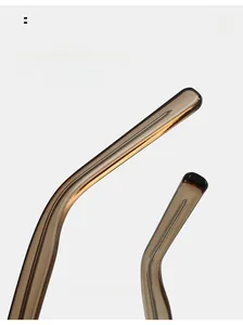 Close-up of amber translucent temple with reinforced metal core for comfort