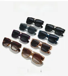 Overhead view of oversized square sunglasses in eight colors with gold metal bridge detail