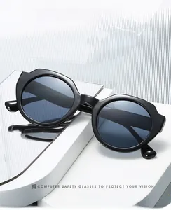 Close-up of black irregular geometric thick frame sunglasses with 2025 modern styling
