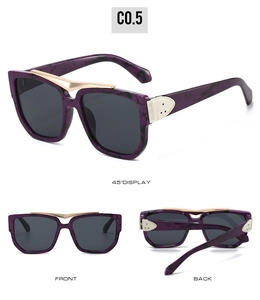 Detail view of square oversized sunglasses with purple marble texture and gold accents