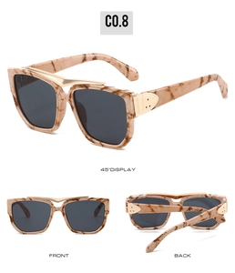 Detailed views of square oversized tortoise sunglasses with gold metal bridge accent