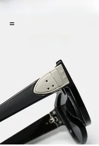 Macro shot of durable silver hinge detail on black square oversized sunglasses frame