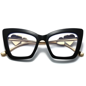 Fashionable black cat-eye glasses with golden heart metal accents on the temples