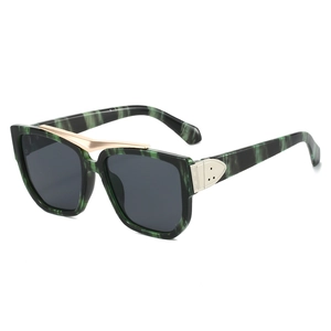 Oversized square sunglasses with green marble pattern frames and gold metal accents