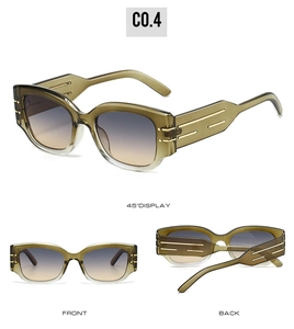 Detail view of olive green round sunglasses with gradient lenses and gold temple accents