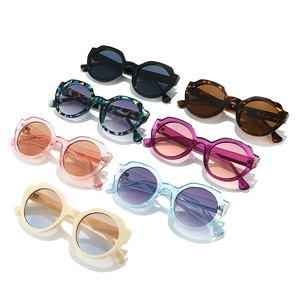 Variety of retro round frame sunglasses in multiple colors for women on white background