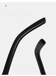 Close-up of sleek black polished sunglass temples with ergonomic curved design