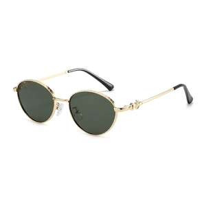 Retro oval sunglasses with gold metal textured frame and dark green lenses in 45-degree view
