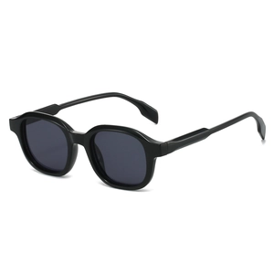 Lunettes de soleil rétro rondes noires avec verres gris foncé et monture épaisse