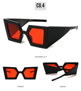 Three-angle views of chunky geometric sunglasses with red lenses and thick black frames