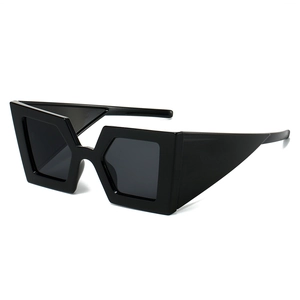 Modern oversized geometric black sunglasses with thick triangular temples for outdoors