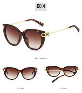 Tortoiseshell cat-eye sunglasses with gold metal temples and brown gradient lenses
