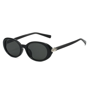 Retro black oval sunglasses with silver metal hinges and dark grey lenses for women
