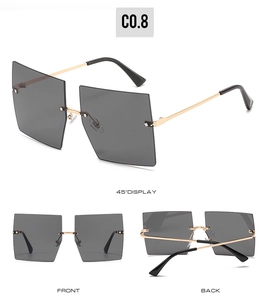 Three-angle views of grey rimless square sunglasses with gold metal temples and model code