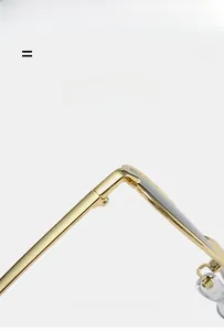 Detail of the golden metal frame showing the super elastic hinge and lightweight structure