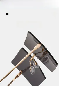 Detail of lightweight golden square sunglasses with super elastic frame and grey lenses