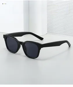 Detail showing high-quality TR90 black thick frame sunglasses with dark sun lenses