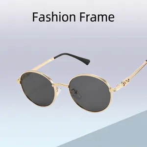 Retro round metal sunglasses with gold frames and dark grey lenses for fashion
