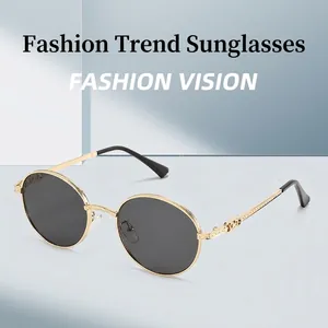 Retro round metal sunglasses with gold frames and black lenses for a vintage style