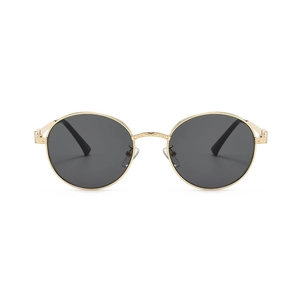 Retro round metal sunglasses with ornate gold frame and dark gray lenses for fashion