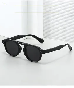 Detail of vintage round TR90 sunglasses showing silver rivets and high-quality texture