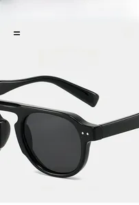 Detail of lightweight TR90 round sunglasses frame with silver rivet craftsmanship