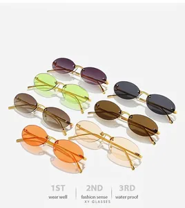Macro view of rimless oval sunglasses showing multiple colorful lenses and golden metal frames