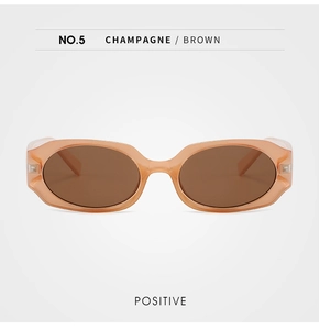 Front view of champagne oval frame sunglasses with brown lenses and retro styling