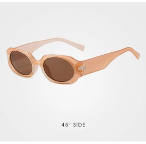 45-degree side view of vintage orange cat-eye sunglasses with brown tinted lenses