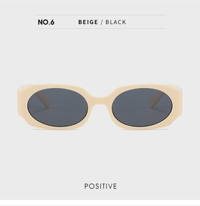Front view of beige oval sunglasses with dark grey lenses in retro 90s style