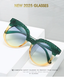 Detail of cat-eye sunglasses with green quilted texture and gradient blue lenses