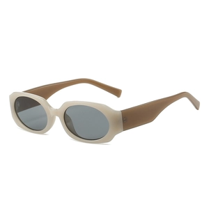 Retro oval sunglasses with beige frame, brown temples and dark grey lenses for fashion