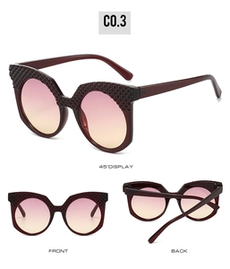 Detailed views of wine red sunglasses with textured cat-eye frames and gradient lenses