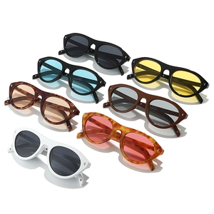 Stylish cat-eye sunglasses with rivet accents in seven colors on a white background